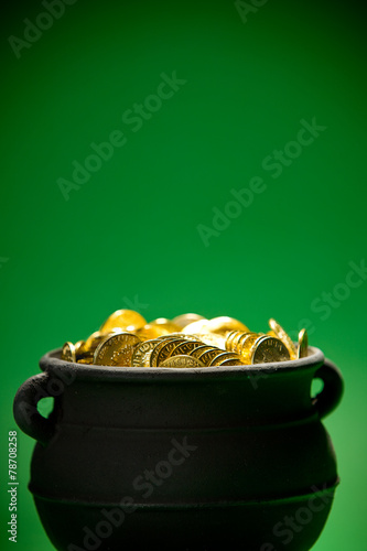 Pot of Gold: Close Up of Gold Coins photo