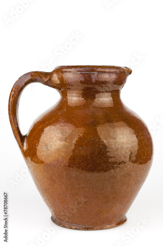 Old clay jug isolated