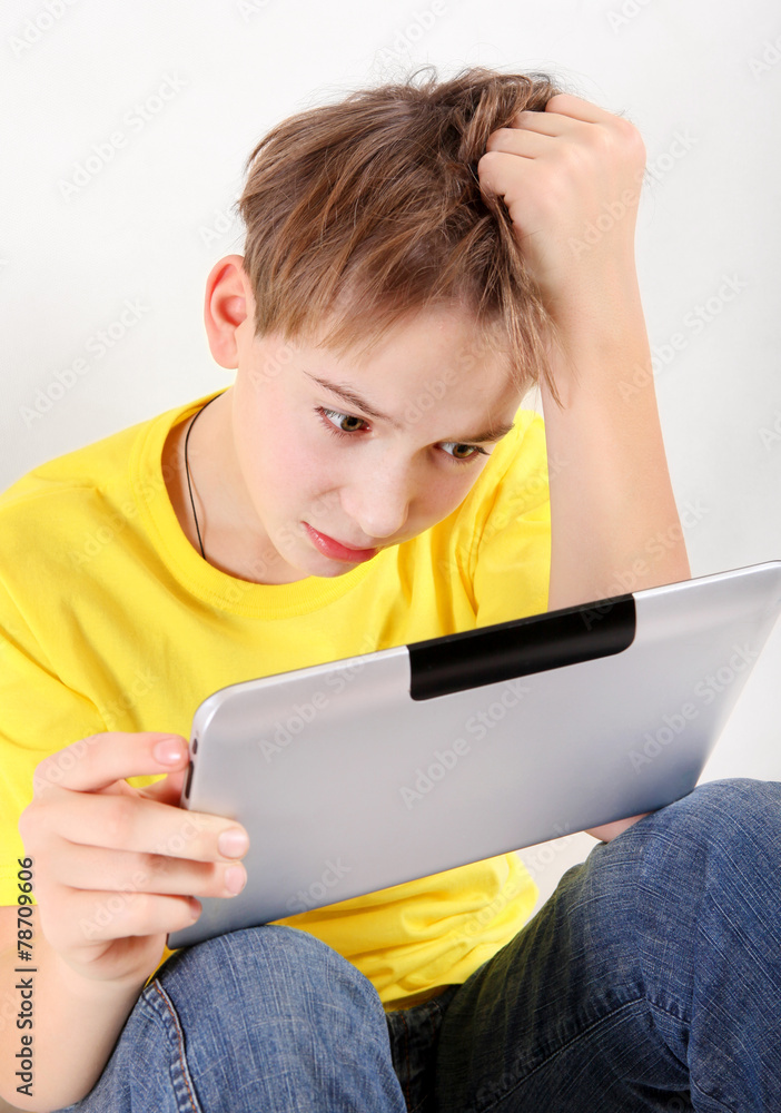 Stressed Kid with Tablet Computer