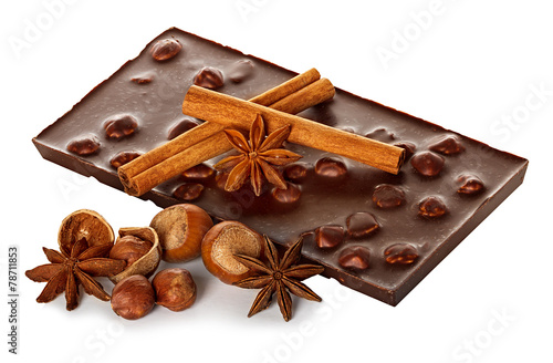 Chocolate and nuts with cinnamon sticks, star anise isolated