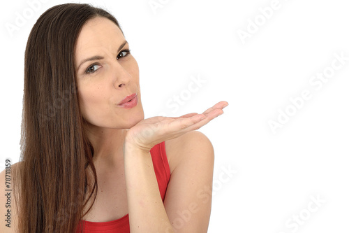 Attractive Young Woman Blowing a Kiss