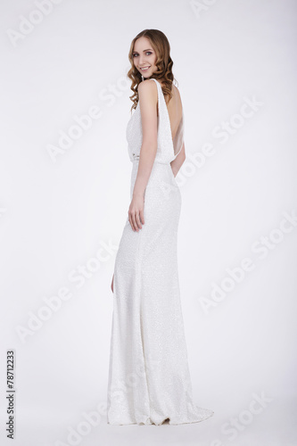 Luxurious Woman in Long Dress Posing