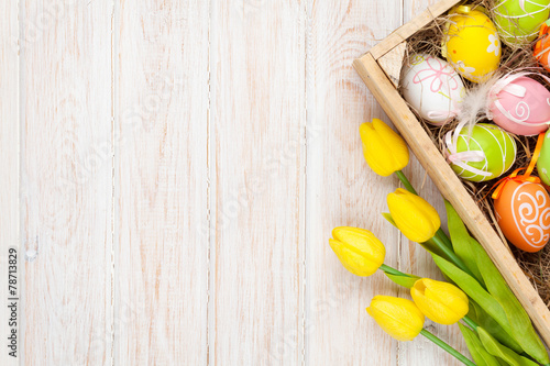 Canvas Print Easter background with colorful eggs and yellow tulips