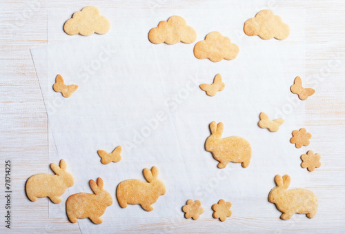 Easter cookies in the shape rabbits, butterflies and clouds