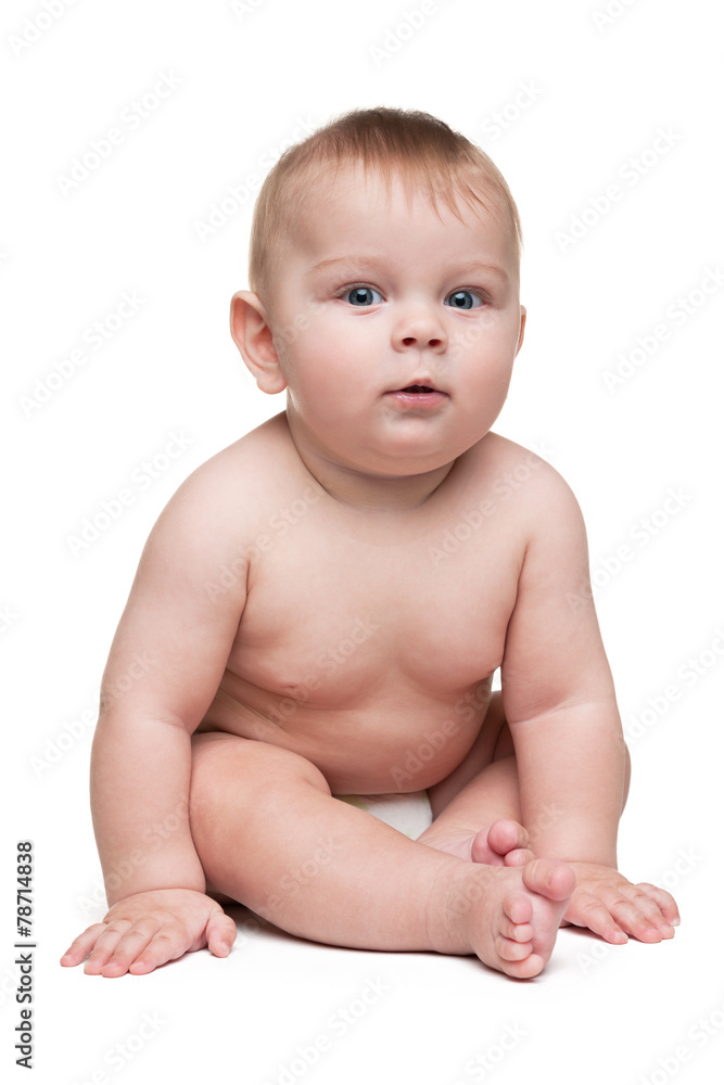 Infant boy sits on the white background Infant boy sits on the white background