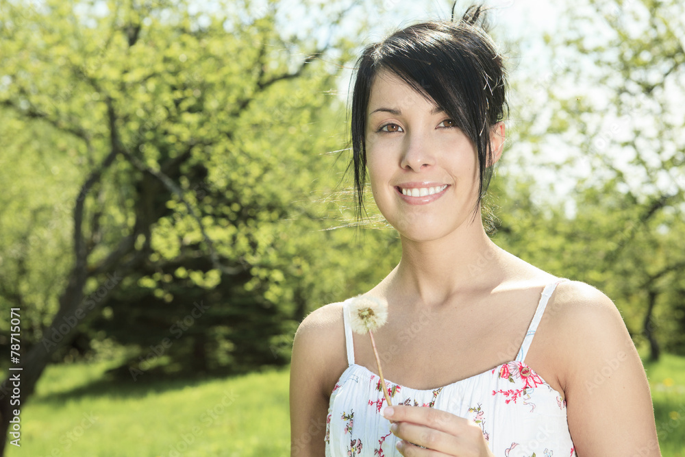 Portrait of a young beautiful woman on the nature Portrait of a young beautiful woman on the nature