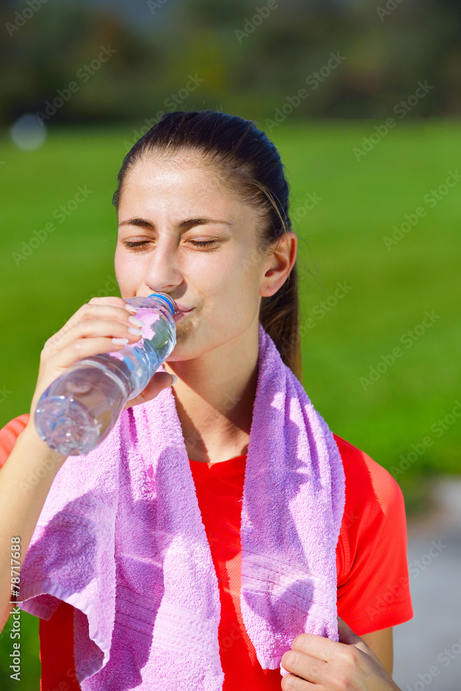 Running woman. Female runner jogging during outdoor workout Running woman. Female runner jogging during outdoor workout