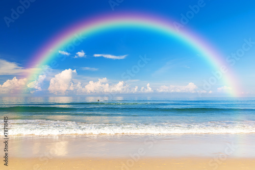 Beautiful sea with a rainbow in the sky