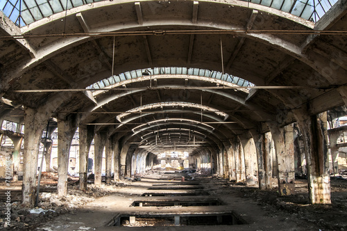 Old abandoned decayed grunge hall of vintage railway plant