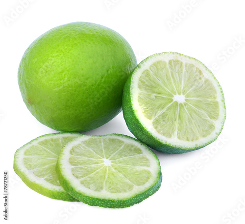 Two limes isolated on a white background