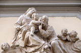 Holy Family, statue on the house facade in Graz, Austria
