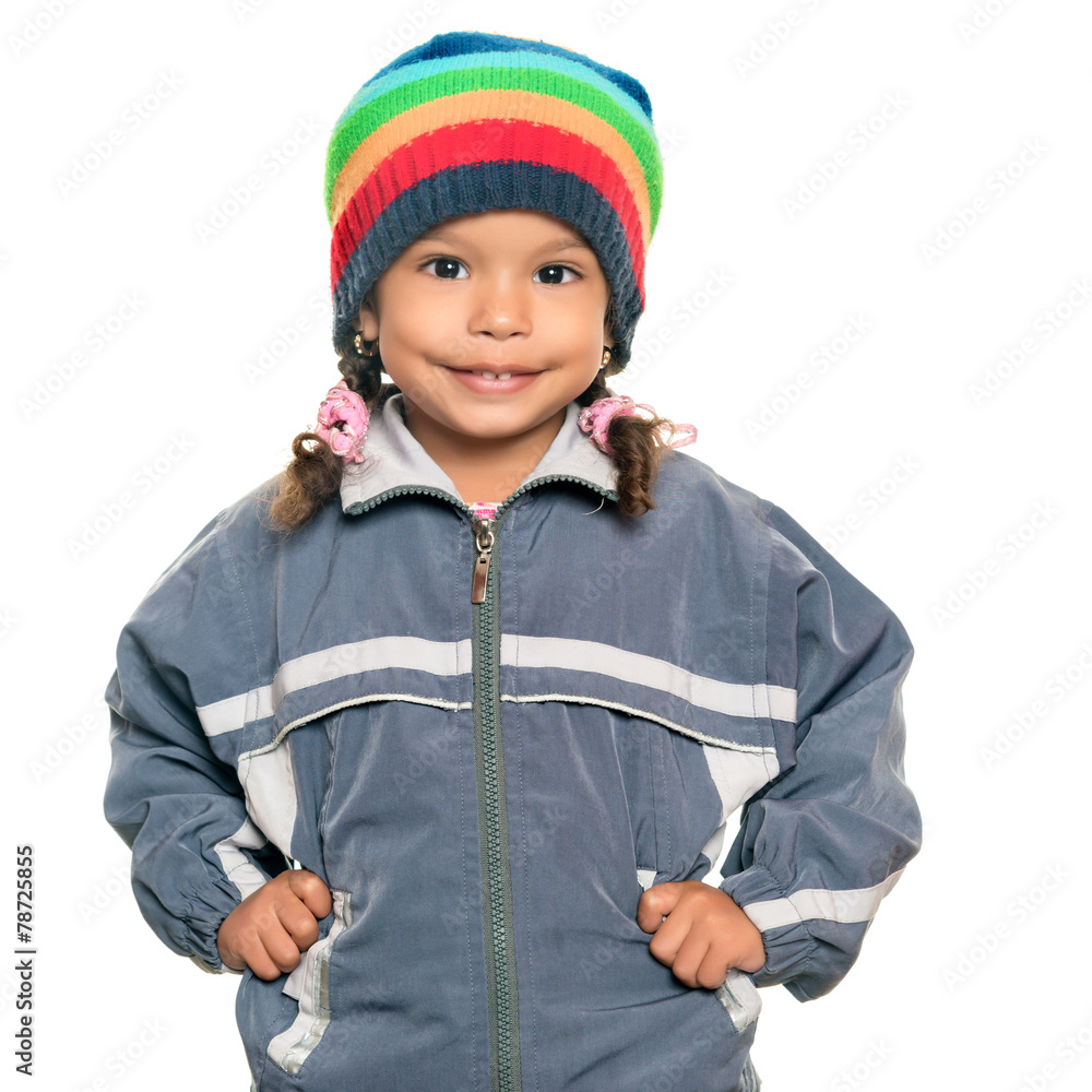 Multiracial girl wearing a jacket and a beanie hat Multiracial girl wearing a jacket and a beanie hat