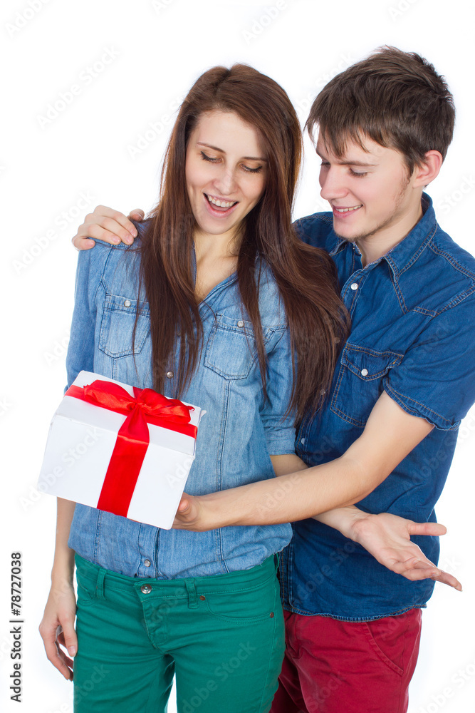 Happy Man giving a gift to his Girlfriend Happy Man giving a gift to his Girlfriend