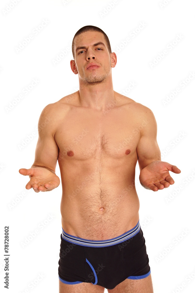 Young athletic man shows palm up sign
