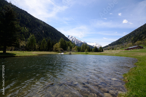 Fototapeta Naklejka Na Ścianę i Meble -  lago alpino montagna stagno