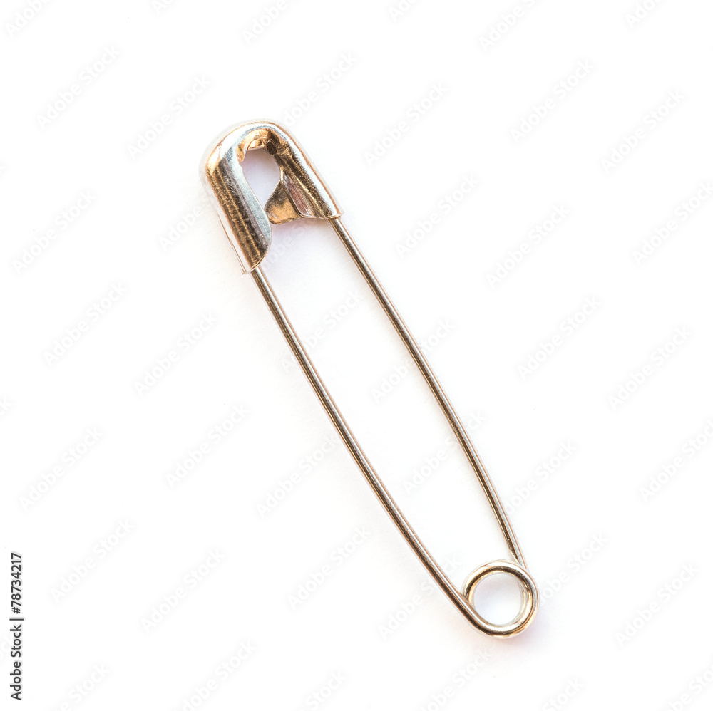 Safety pin isolated on white background Safety pin isolated on white background