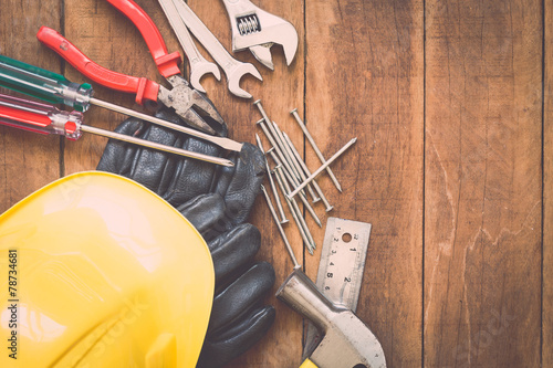 Assorted work tools on wood