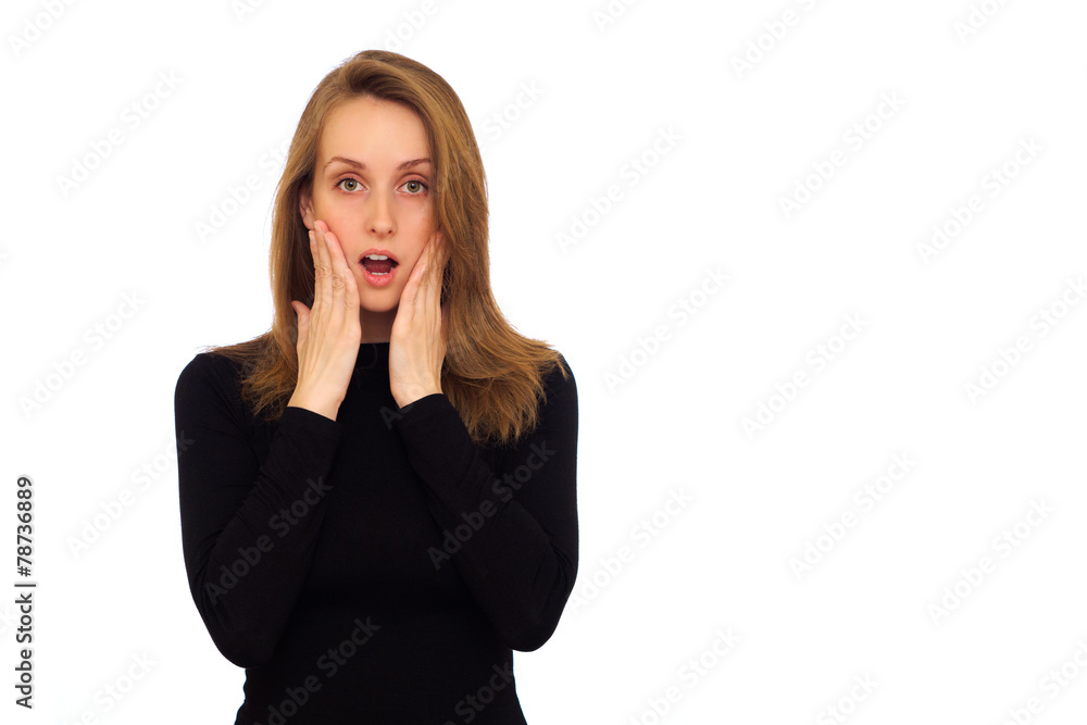 Portrait of a young woman with a surprised face expression Portrait of a young woman with a surprised face expression