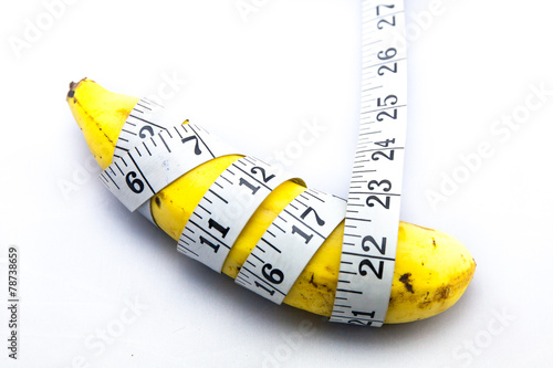 Banana wrapped up with Measure Tape