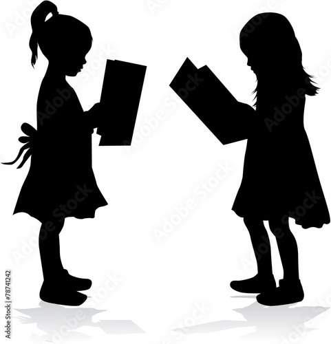 Silhouette of a girl reading a book.