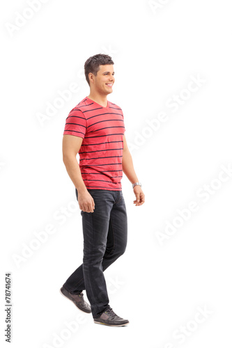Casual man walking on white background