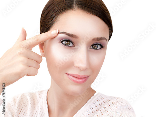 Billede på lærred Woman's face with dewy skin make up