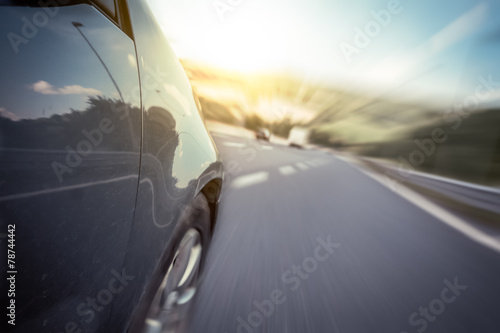 Driving on the highway. Motion blurred background