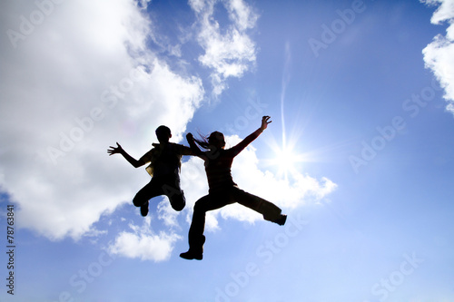 Wallpaper Mural silhouette of women and the boy jump to the sky Torontodigital.ca