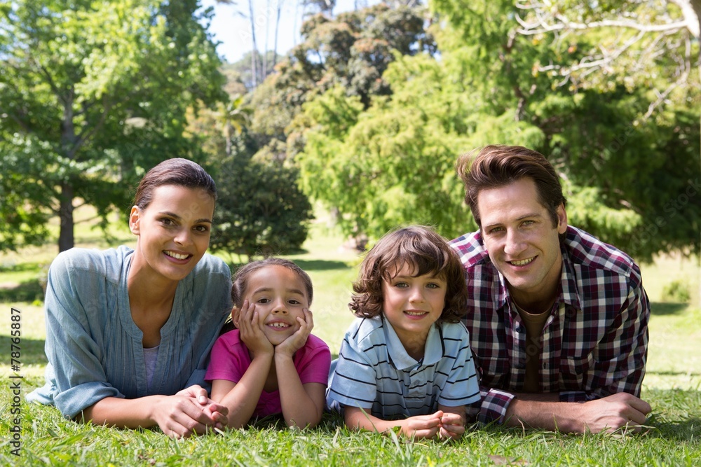 Fototapeta premium Happy family smiling at camera