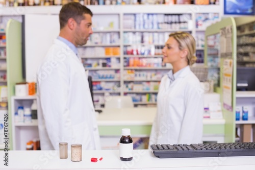 Pharmacists talking each other