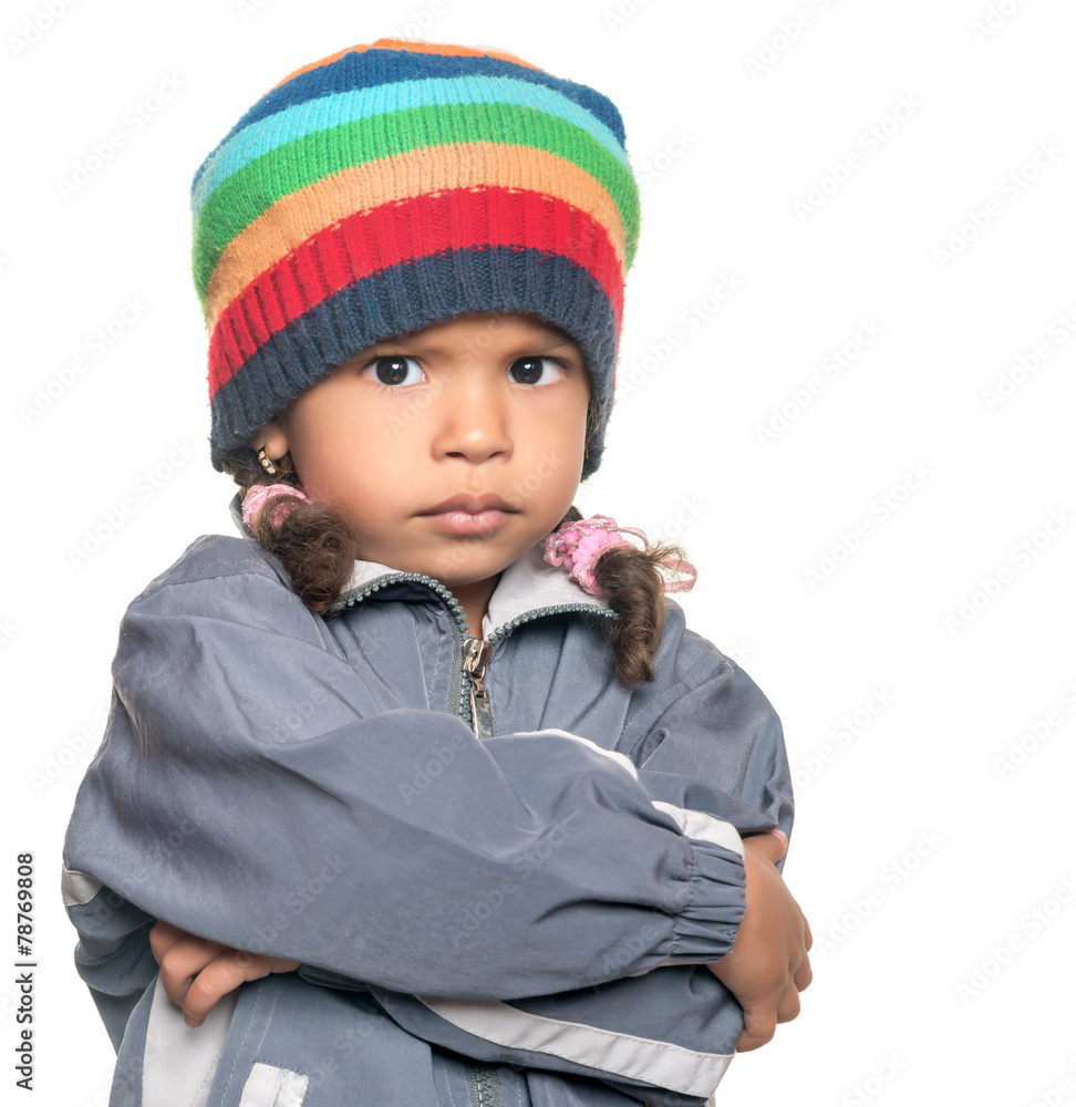 Angry little multiracial girl isolated on white Angry little multiracial girl isolated on white