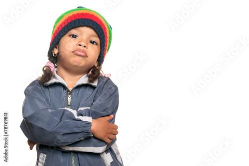 Little multiracial girl with a hip hop artist look