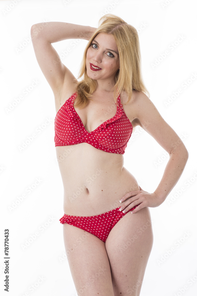 Attractive Young Woman Wearing a Red Polka Dot Bikini Attractive Young Woman Wearing a Red Polka Dot Bikini