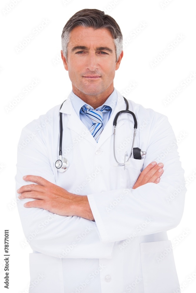 Serious doctor looking at camera