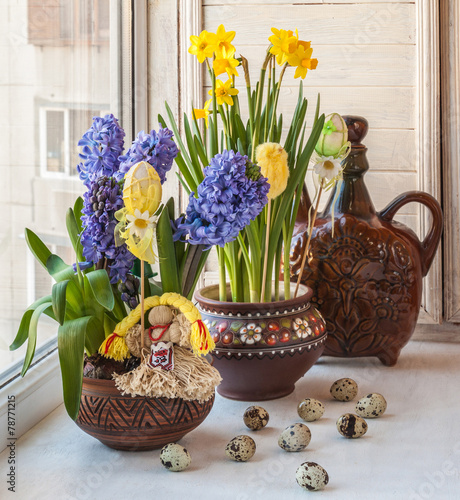 Hyacinths in a pot Ukrainian and Ukrainian folk toy. photo