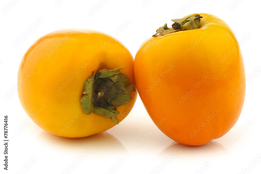 fresh kaki fruits on a white background fresh kaki fruits on a white background