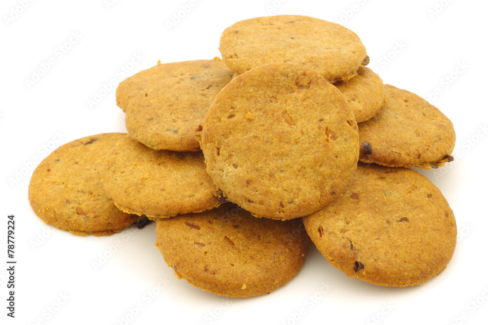 freshly baked cheese and tomato cookies on a white background freshly baked cheese and tomato cookies on a white background