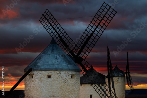 Windmills after sunset, Consuegra, Castile-La Mancha, Spain photo