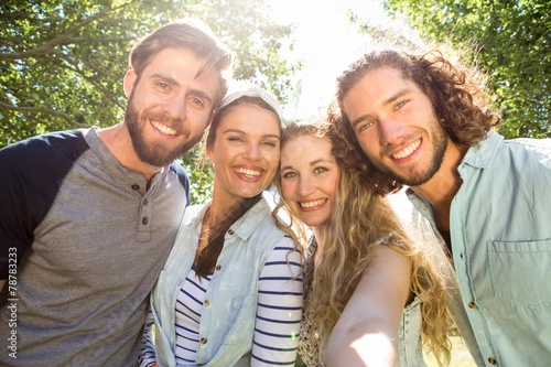 Happy friends taking a selfie