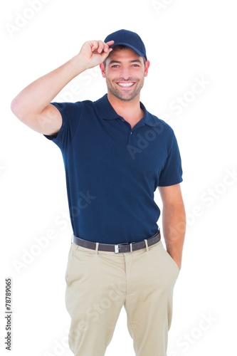 Portrait of happy delivery man wearing cap