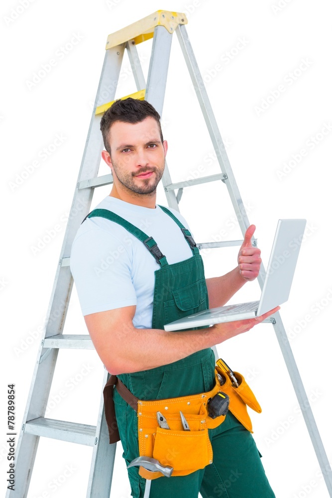 Carpenter using laptop Carpenter using laptop