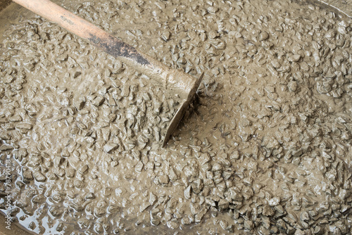 mixed fresh concrete on construction site photo