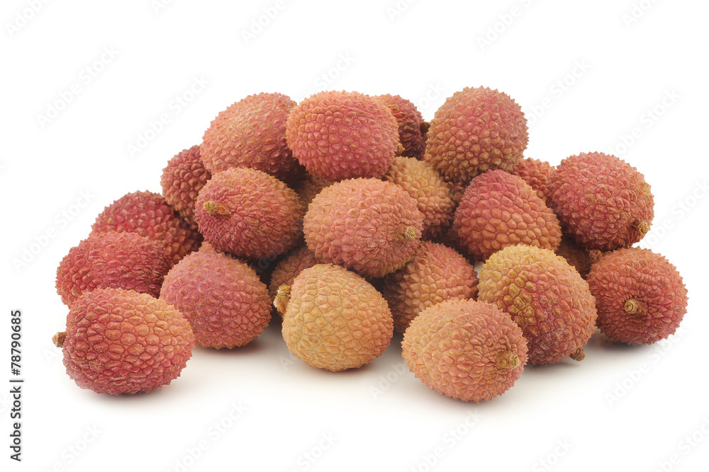  fresh lychees on a white background
