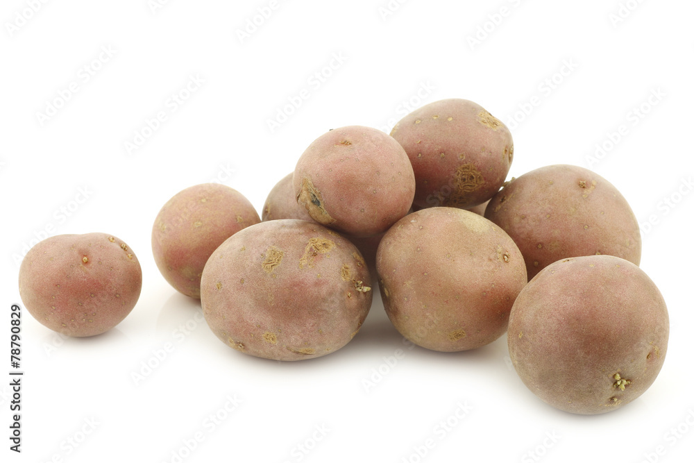 Cherry potatoes (small dutch potatoes) on a white background Cherry potatoes (small dutch potatoes) on a white background