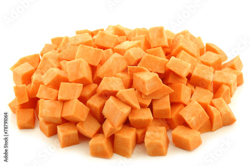 Sweet potato cubes on a white background