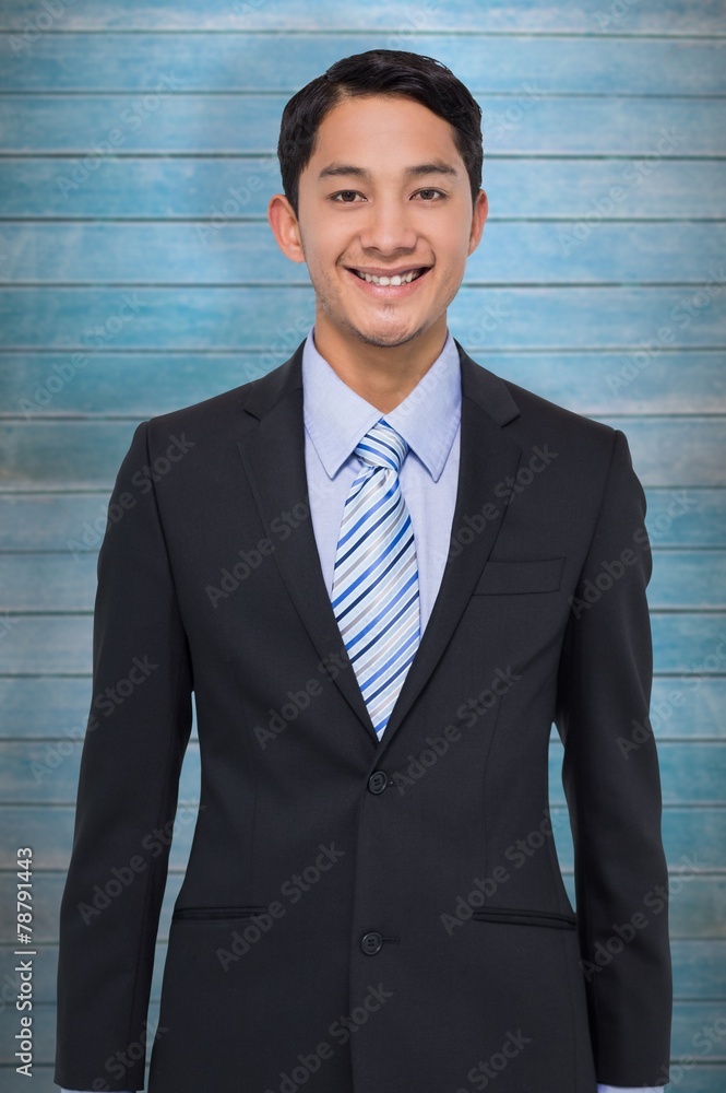Composite image of smiling asian businessman