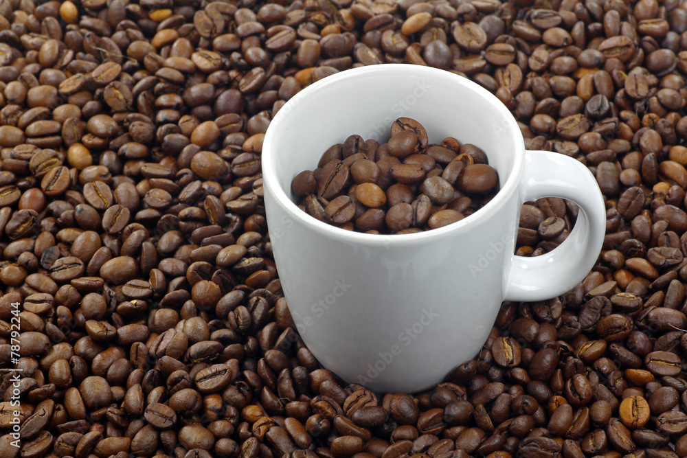 coffee cup with coffee beans background