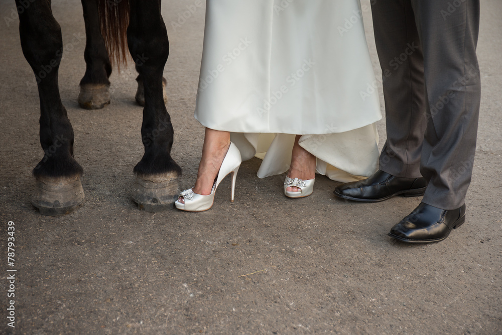 wedding feet bride groom horse shoe shot