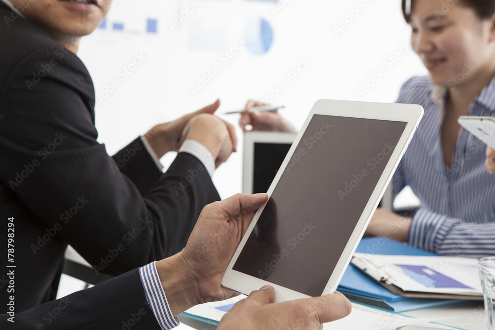 Businessmen are using electronic tablet Businessmen are using electronic tablet