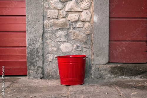 Red garbage can